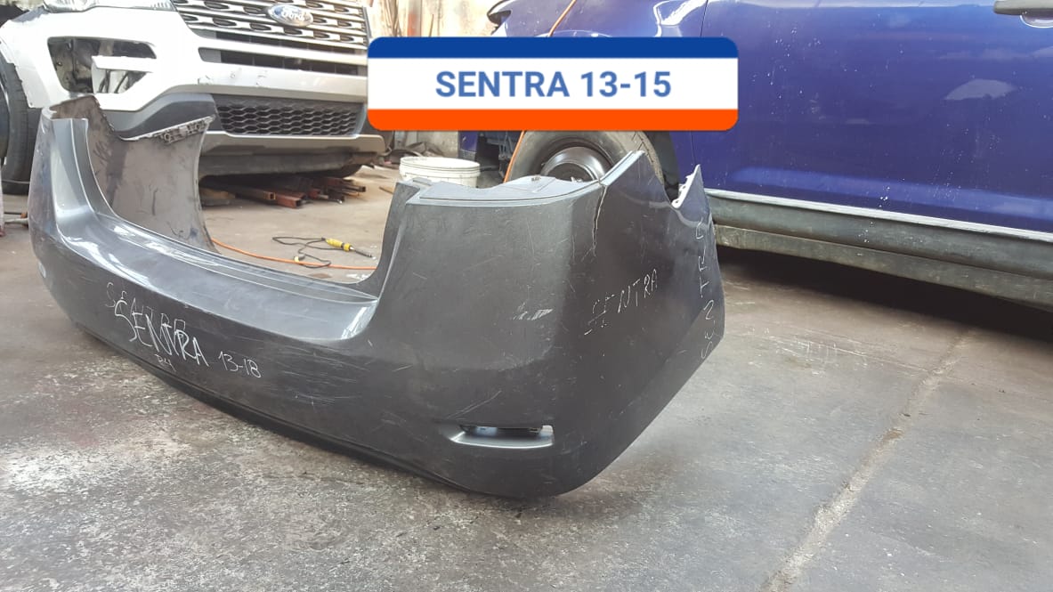 PARACHOQUES POSTERIOR NISSAN SENTRA 2013 AL 2015 CON DETALLE